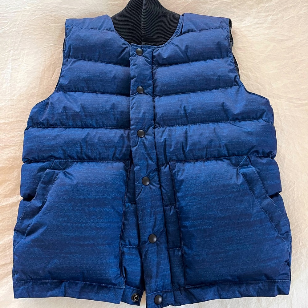Reigning champ x crescent down works collab down puffer vest